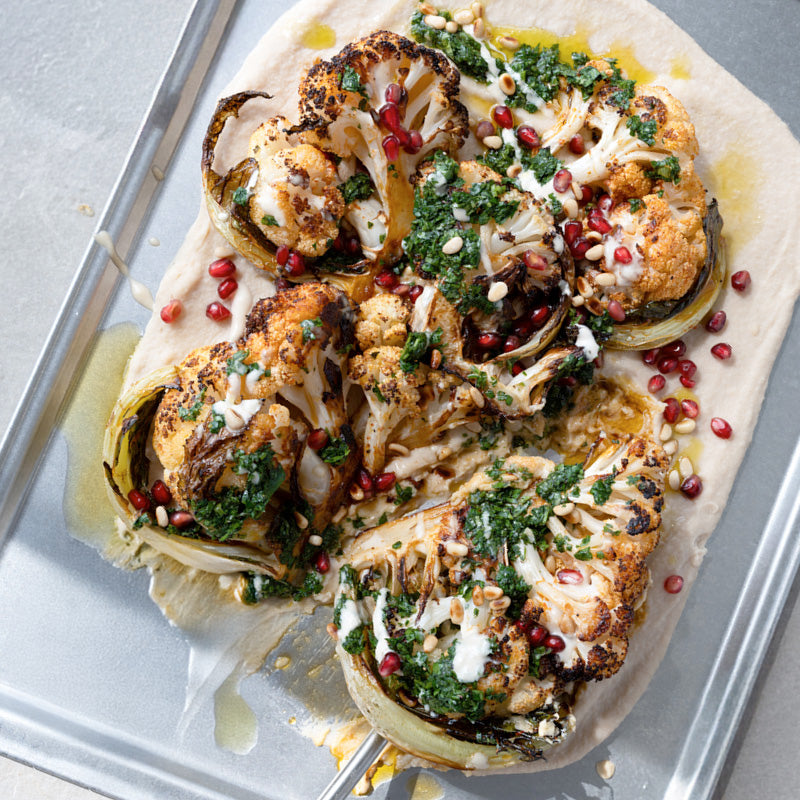 Charred Cauliflower Steaks With Chimichurri, Pine Nuts & Pomegranate Seeds Over Creamy Butterbean Mash