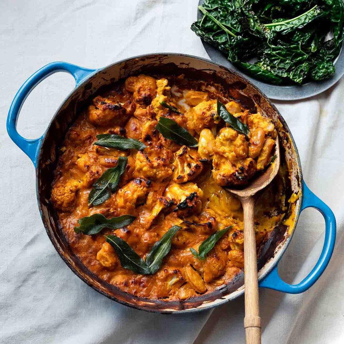 Cheesy Pumpkin & Cauliflower Gratin With Tender Butter Beans, Cavolo Nero & Crispy Sage