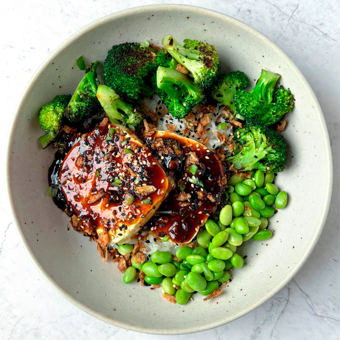 Chilli Garlic Glazed Tofu With Sticky Rice, Charred Broccoli, Edamame & Crispy Chilli Shallots