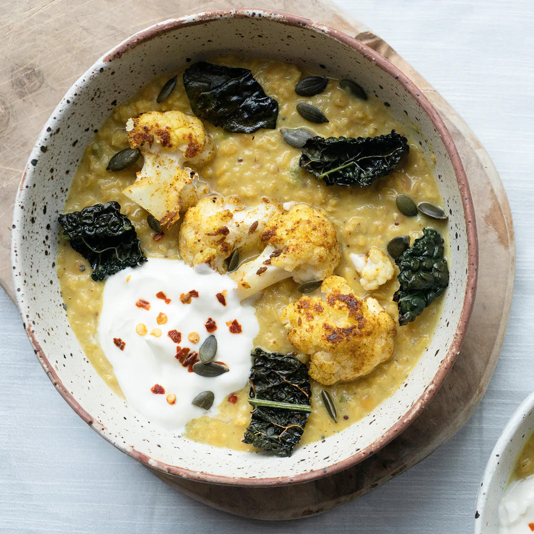 Creamy Coconut Daal With Spice Roasted Cauliflower, Crispy Kale & Coconut Yoghurt