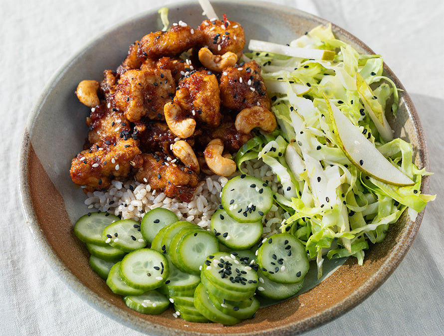 Crispy Chilli Tofu With Toasted Cashews, Short Grain Brown Rice, Sesame Hispi & Pear Slaw & Cucumber Pickle