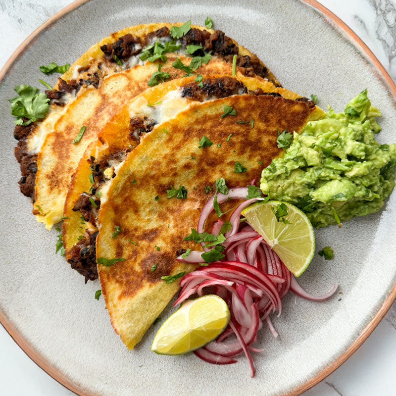 Crispy Chipotle Pumpkin & Black Bean Tacos With Melted 'Mozzarella', Guacamole & Pink Onion Pickles