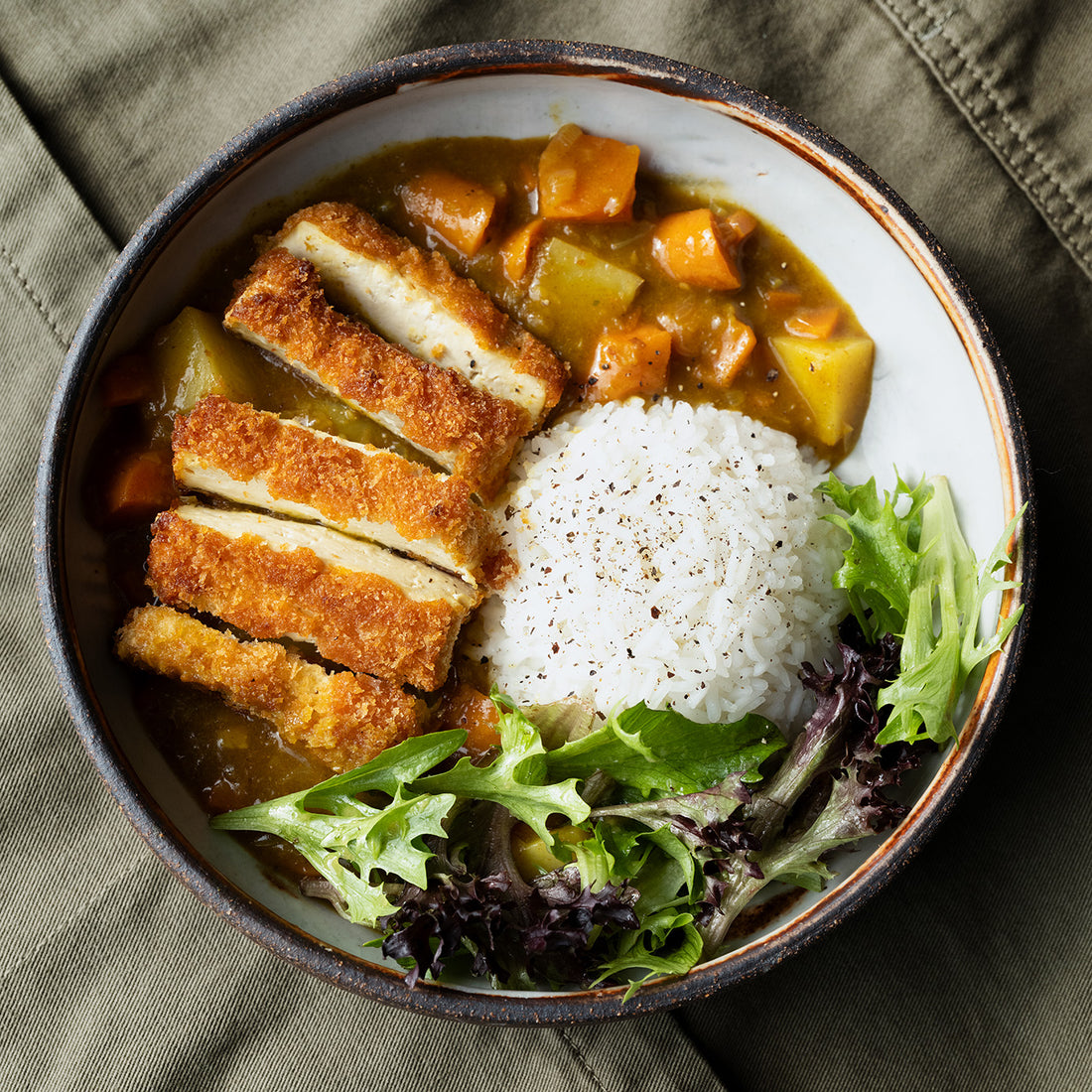 Crispy Tofu Katsu Curry With Sticky Rice & Seasonal Mixed Leaves In Sweet Miso Dressing