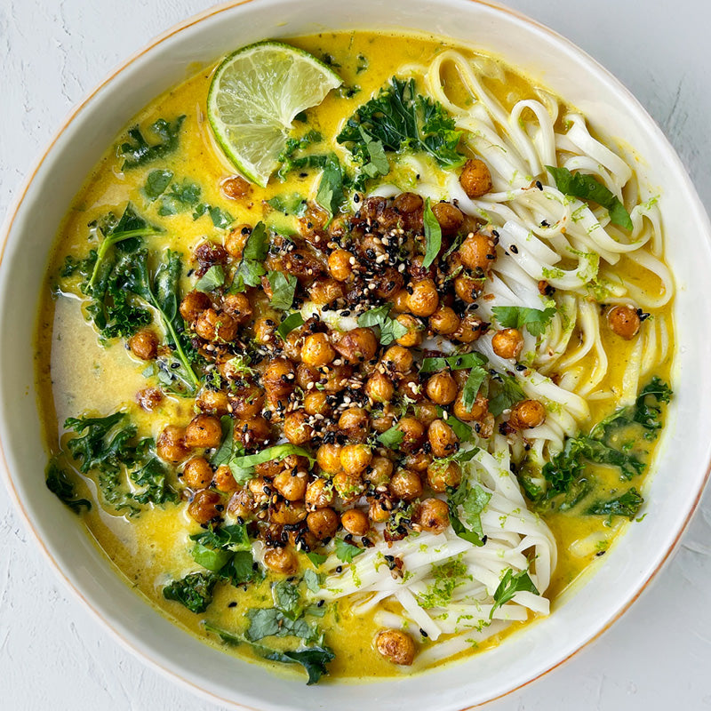 Curried Squash Noodle Soup With Rice Noodles, Crispy Coconut Chickpeas & Fresh Green Kale