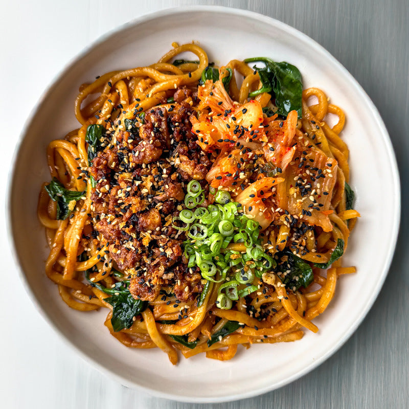 Kimchi Stir Fried Noodles With Crispy Tempeh Mince, Cabbage, Carrot, Spring Onions & Sesame Gochugaru Crunch