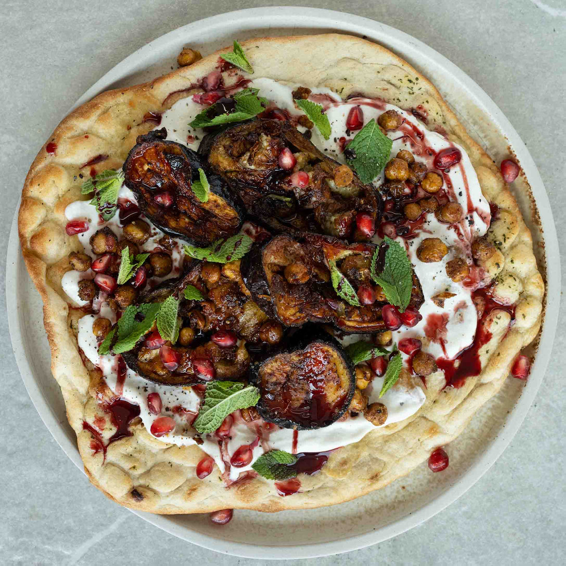 Middle Eastern Aubergine Flatbreads With 'Labneh', Pomegranate, Crispy Chickpeas, Garlic Tahini & Fresh Mint