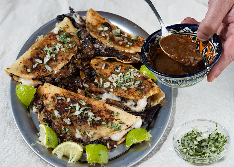 Mushroom Birria Tacos With Melted House Queso, Onion Salsa & Rich Dipping Consommé