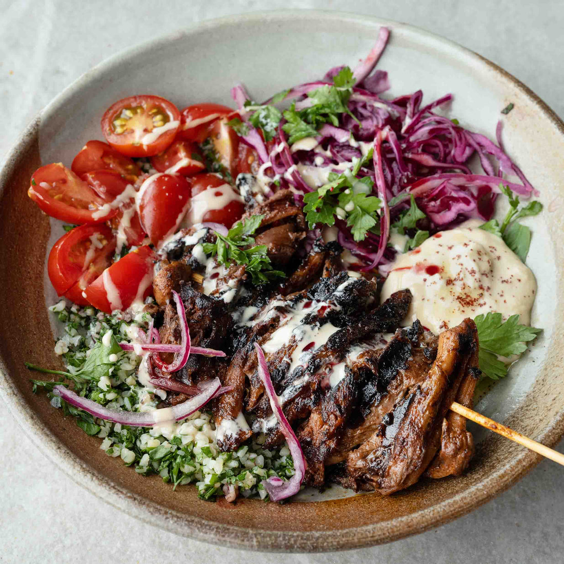 Oyster Mushroom Shawarma Bowl With Bulgar Tabbouleh, Hummus, Sumac Pickled Cabbage, Cherry Tomatoes & Tahini Sauce