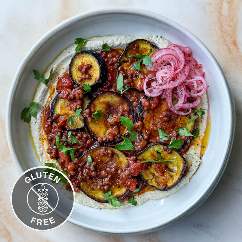 Saucy Harissa Lentils & Charred Aubergine Over Whipped Tahini With Sumac Pickled Onion & Fresh Parsley