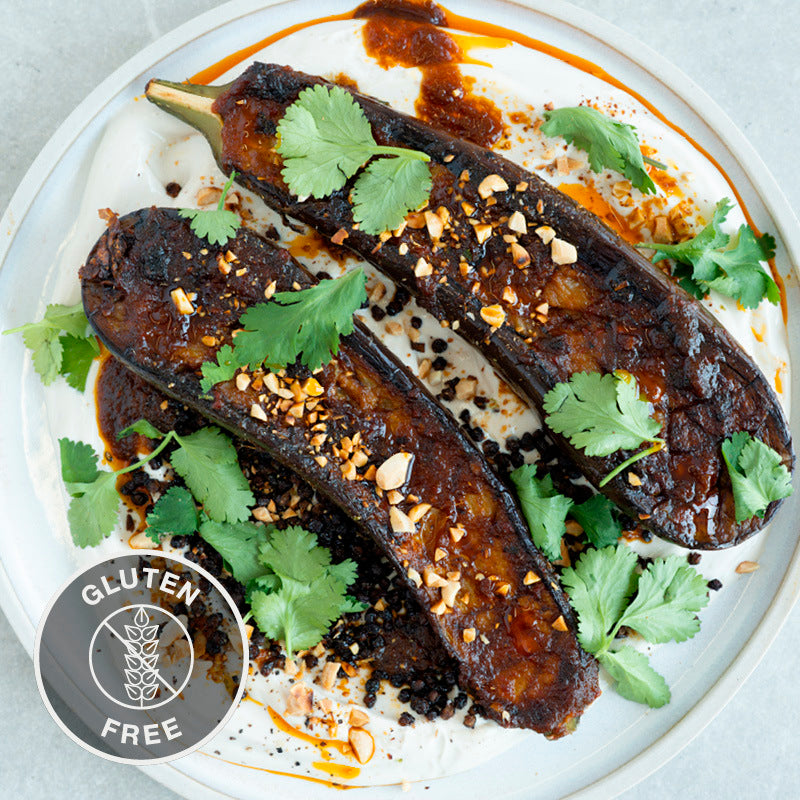 Sticky Aubergine Sambal Over Tamarind Whipped Tofu With Crispy Lentils, Toasted Peanuts & Coriander