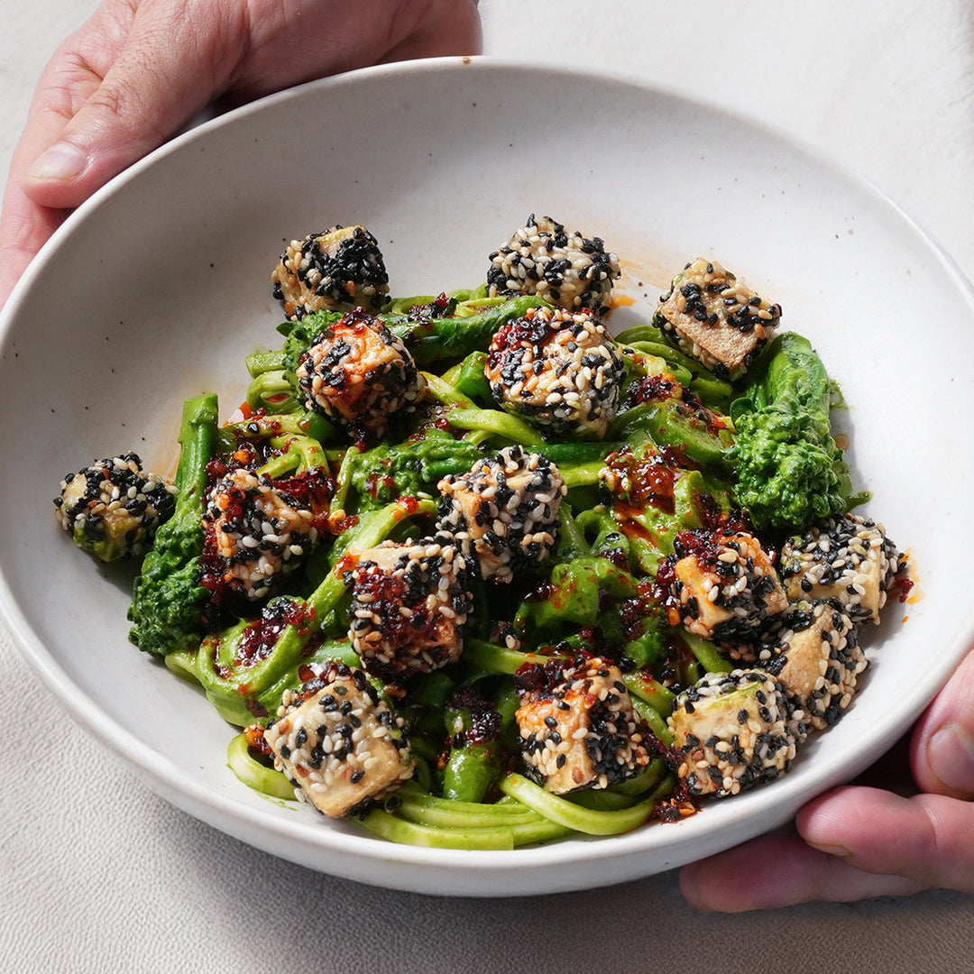Super Green Udon Noodles With Tenderstem Broccoli, Crispy Sesame Crusted Tofu & Rayu Chilli Drizzle