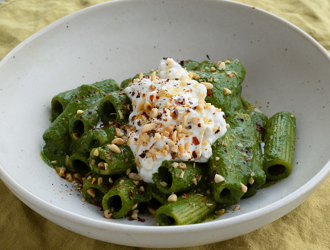 Super Green Wholewheat Rigatoni With Wild Garlic Sauce, Peas, Cavolo Nero, Creamy 'Burrata' & Chilli Pine Nut Crumb