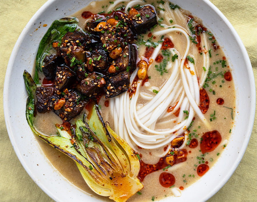 Tahini Miso Udon Noodle Soup With Sweet & Smoky Chilli Glazed Aubergine, Pak Choi & Chives